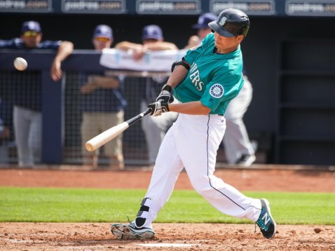 Outfielder Nori Aoki flies out to right in the bottom of the third as the Seattle Mariners play their annual Charity Game against the San Diego Padres for the first game of spring training in Peoria, Arizona, Wednesday March 2, 2016. (Bettina Hansen / The Seattle Times)